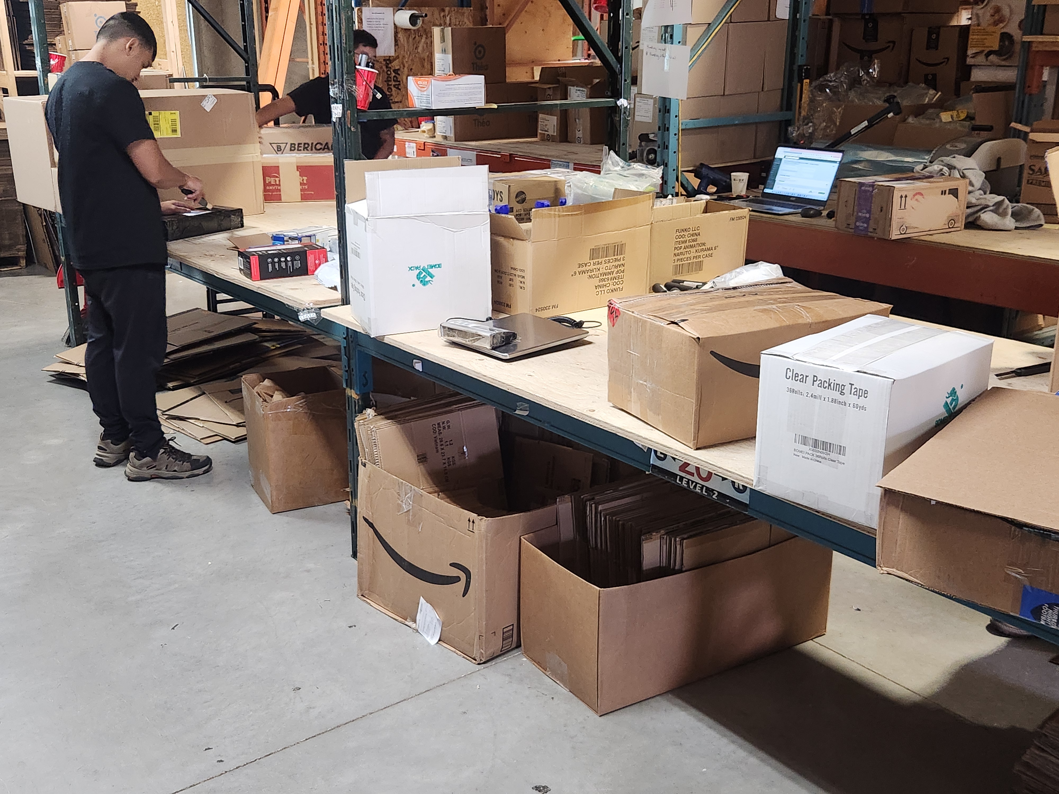 Ebb & Flow team member sorting products