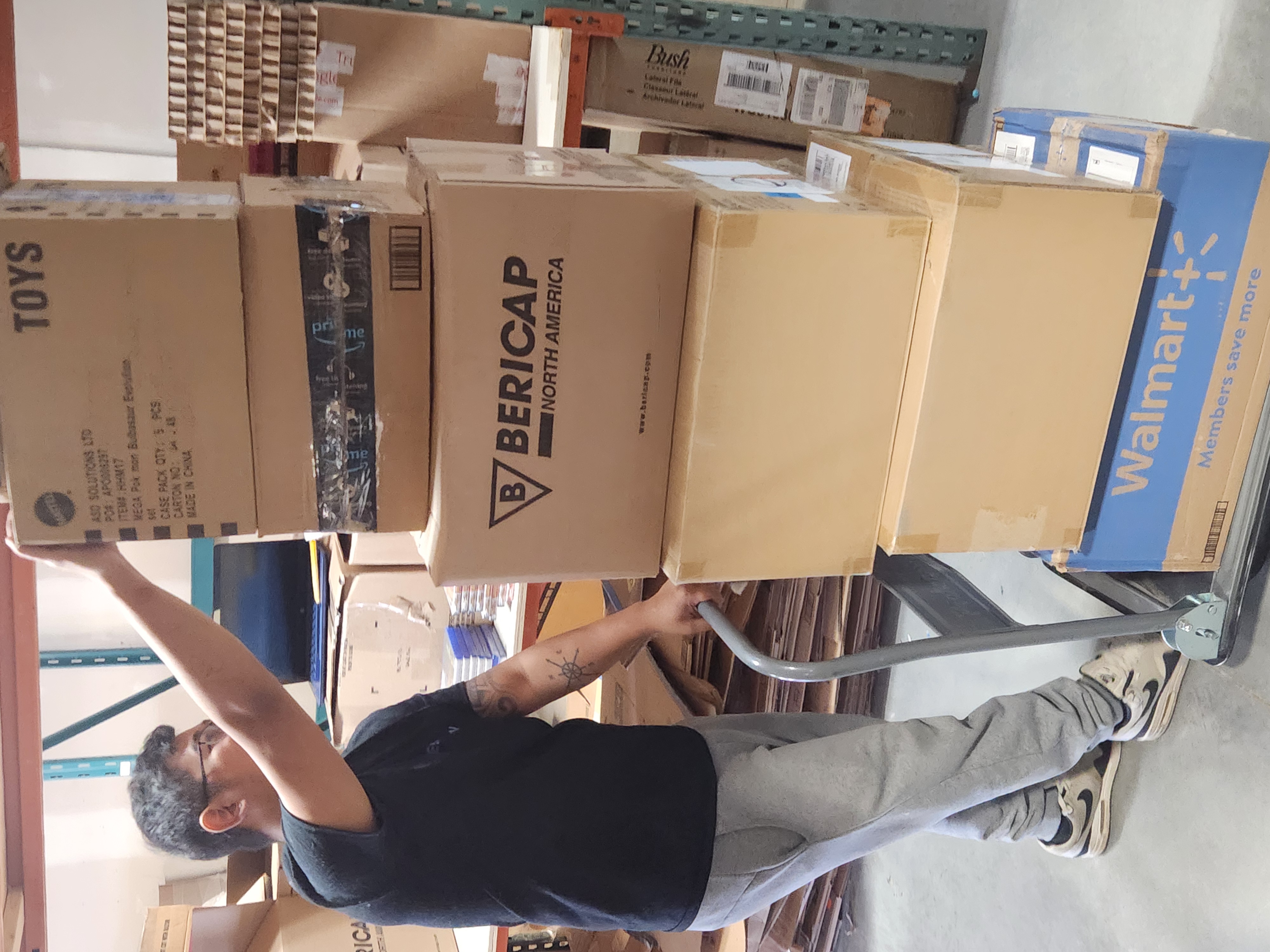 Moving boxes on a hand truck